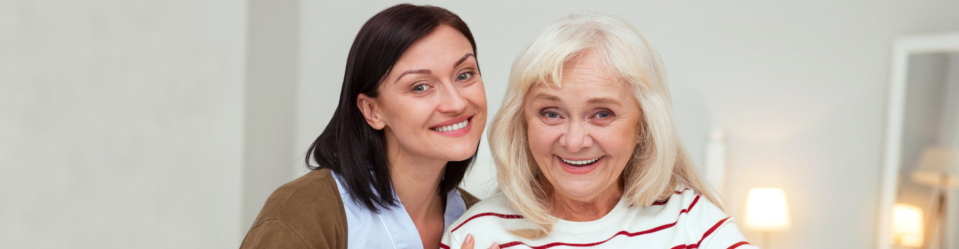 woman smiling with elderly woman